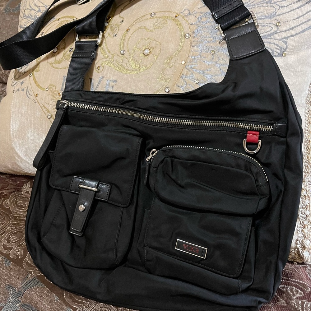 Tumi Crossbody Voyageur black purse